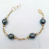 Bracelet avec breloques couleur "or"