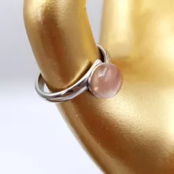 la bague gentiane, ajustable et ornée d'une pierre naturelle agate, est en acier inoxydable argenté.