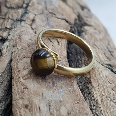 bague gentiane, ajustable et ornée d'une pierre naturelle oeil de tigre, en acier inoxydable doré.