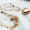 Collier en acier inoxydable aux lignes pures, avec un pendentif coeur graphique.
