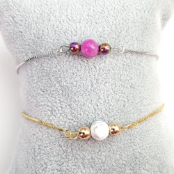 Bracelet lactuca en argent ou plaqué or. 
Il est orné de trois perles de pierres naturelles aux couleurs variées. D
