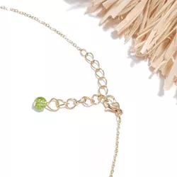 collier alysson en acier inoxydable doré péridot forme fleurs