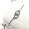 le bracelet "Patoche" en fil de cuir noir et menotte,  en acier inoxydable argenté
