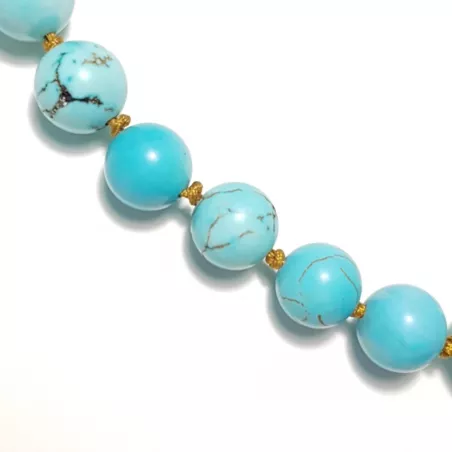 Collier a nœud Adhara turquoise hematite et acier inoxydable doré