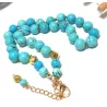 Collier a nœud Adhara turquoise hematite et acier inoxydable doré