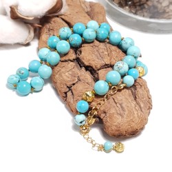 Collier a nœud Adhara turquoise hematite et acier inoxydable doré