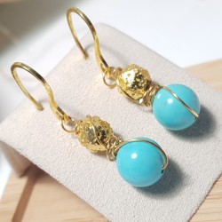 Boucles d'oreilles pendantes Adhara, turquoise, hématite et acier inoxydable doré