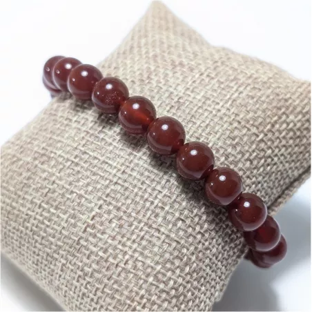 Bracelet en cornaline 8mm et perle acier doré