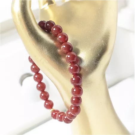 Bracelet en cornaline 8mm et perle acier doré