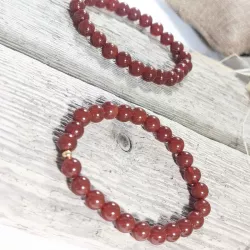 Bracelet en cornaline 8mm et perle acier doré
