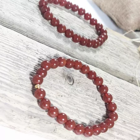 Bracelet en cornaline 8mm et perle acier doré