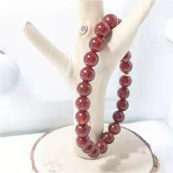 Bracelet en cornaline 8mm et perle acier doré