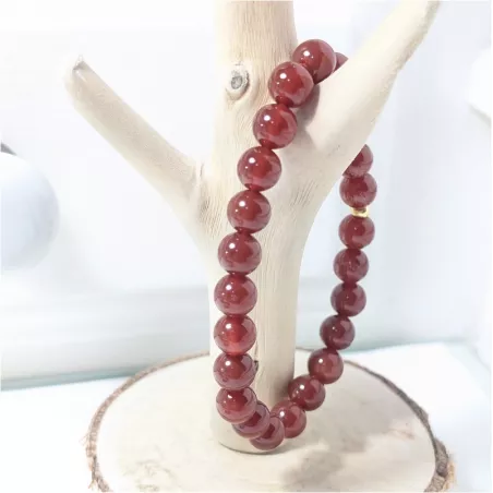 Bracelet en cornaline 8mm et perle acier doré