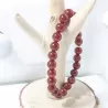 Bracelet en cornaline 8mm et perle acier doré