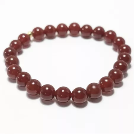 Bracelet en cornaline 8mm et perle acier doré