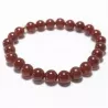 Bracelet en cornaline 8mm et perle acier doré