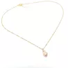 Collier pendentif Centauri avec perle rosée, acier doré