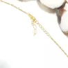 Collier pendentif Centauri avec perle rosée, acier doré