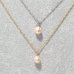 Collier pendentif Centauri avec perle rosée, acier doré et argenté