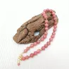 Collier en perles rondes de rhodonite et acier dore
