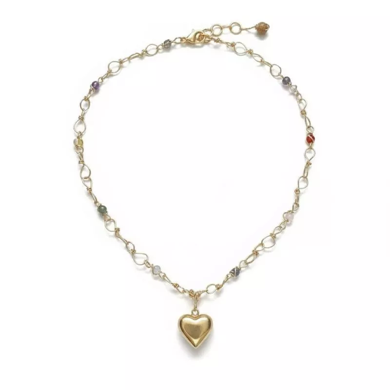 Collier en acier inoxydable aux lignes pures, avec un pendentif coeur graphique. Collier en acier inoxydable aux lignes pures, avec un pendentif coeur graphique.