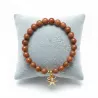 Bracelet extensible Majoris avec breloque etoile de mer et perles naturelles