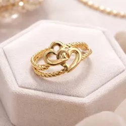 Bague femme motif cœur en finition dorée et argentée