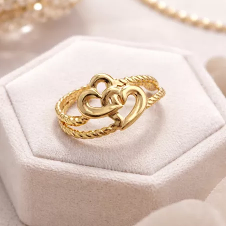 Bague femme motif cœur en finition dorée et argentée