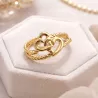 Bague femme motif cœur en finition dorée et argentée