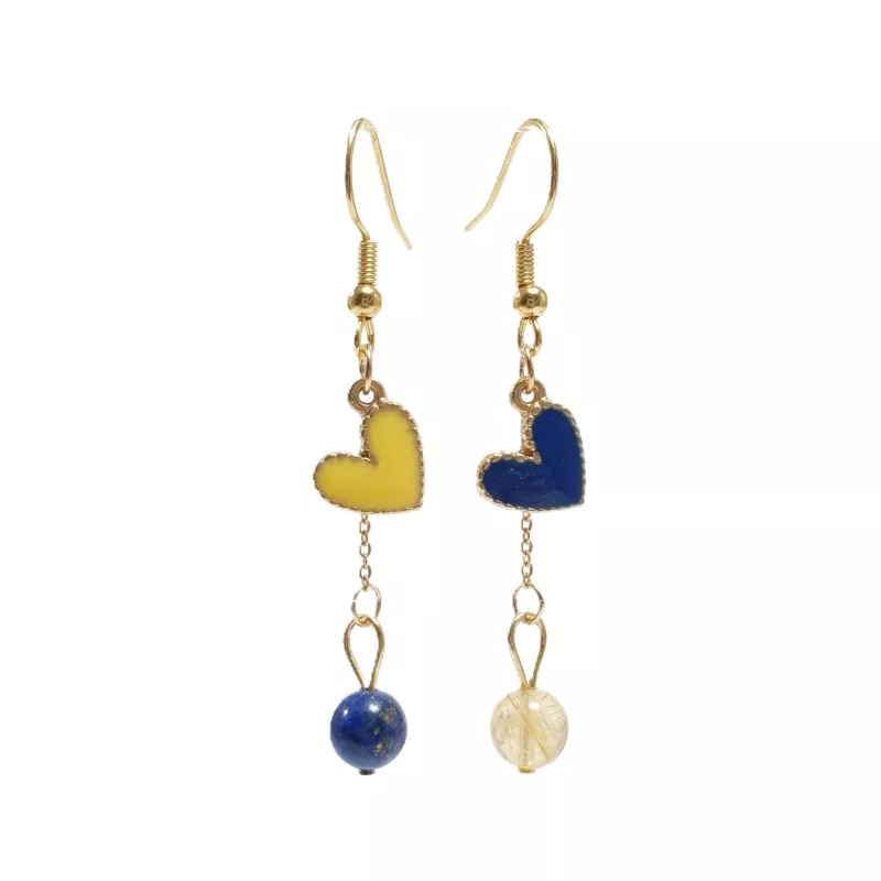 boucles passion avec un coeur et pierre naturelle, acier inoxydable doré, jaune et bleu, sur fond blanc