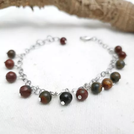 Un bracelet avec perles rondes picasso