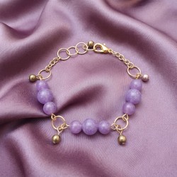 Bracelet Physalis en calcédoine lilas sur un tissu